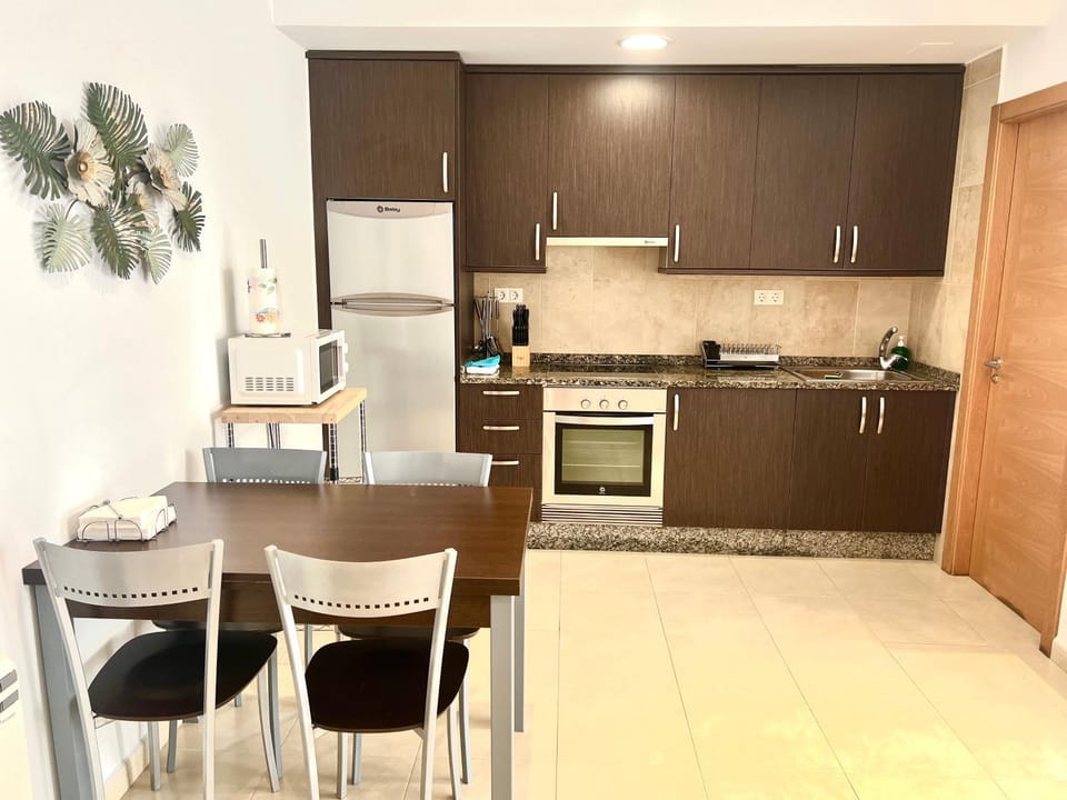 Kitchen or kitchenette, Dining area, oven, stove, toaster