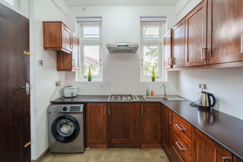 Coffee/tea facilities, Kitchen or kitchenette, stove, toaster, washing machine