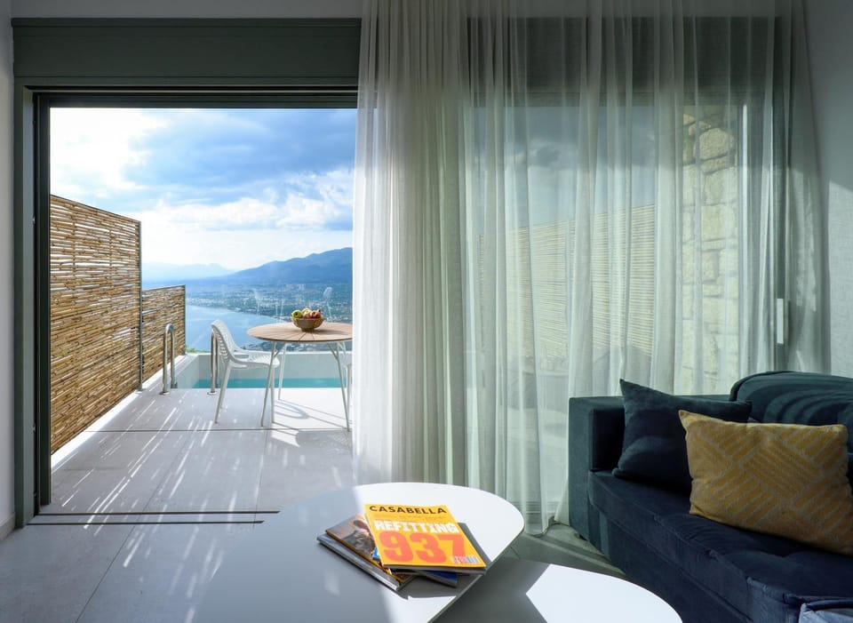 Natural landscape, View (from property/room), Balcony/Terrace, Living room, Seating area, Pool view, Sea view, Swimming pool, sunbed