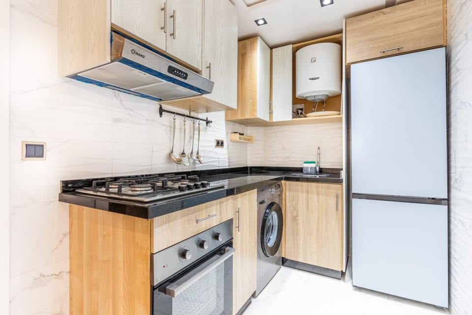 Kitchen or kitchenette, oven, stove