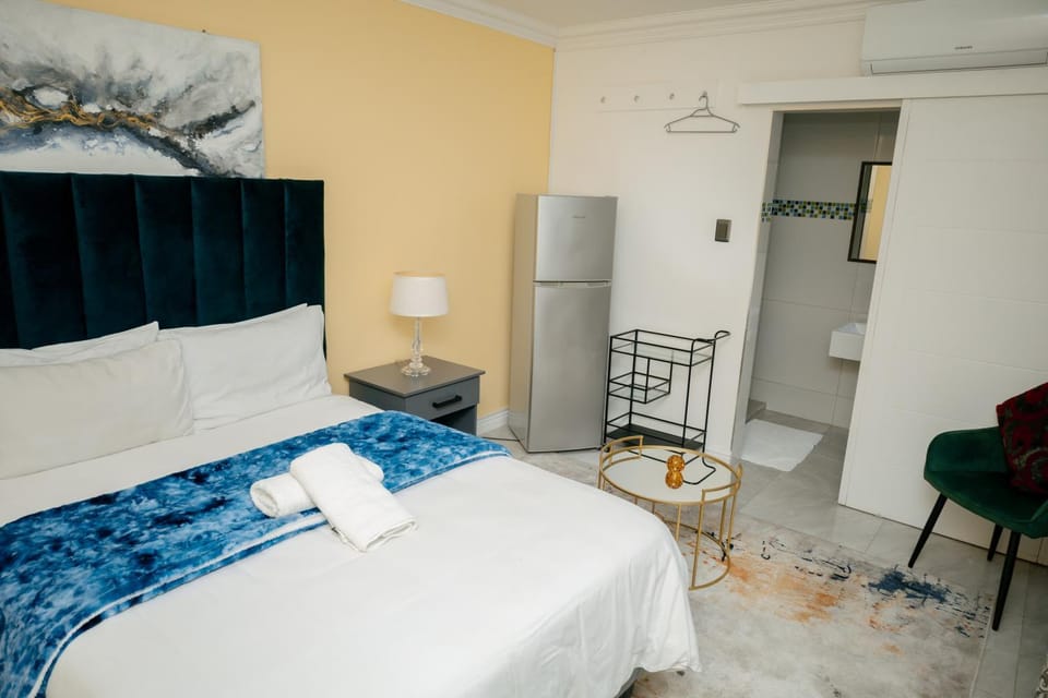 Bed, Bedroom, towels, wardrobe, air conditioner