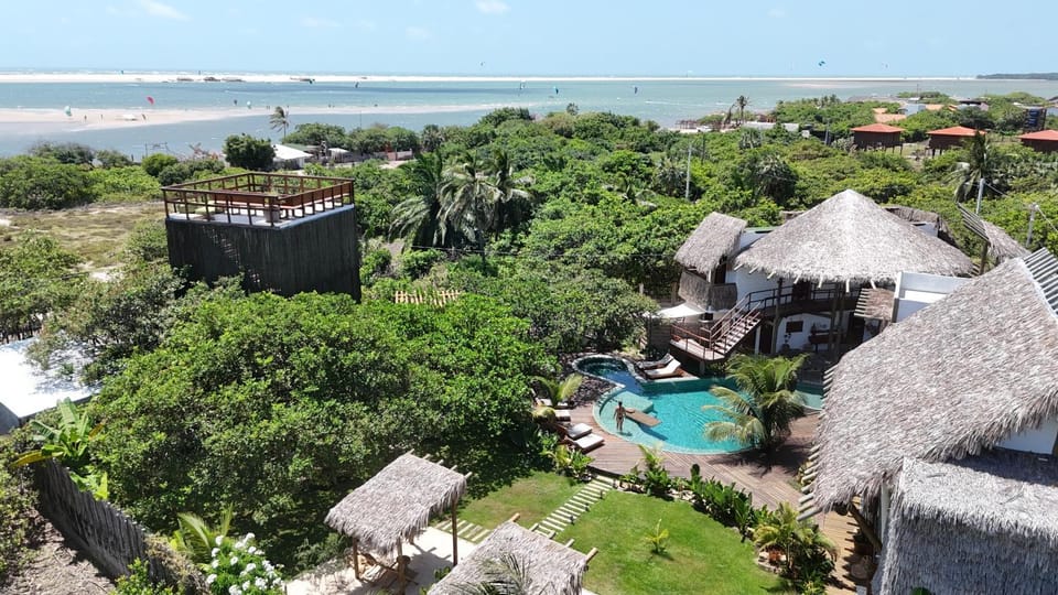 Property building, Nearby landmark, Day, Natural landscape, Bird's eye view, Garden, Beach, Garden view, Pool view, Sea view, Swimming pool, sunbed
