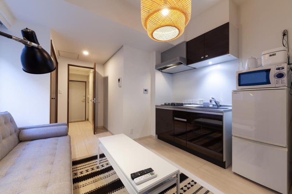Kitchen or kitchenette, Living room, Seating area, minibar, stove