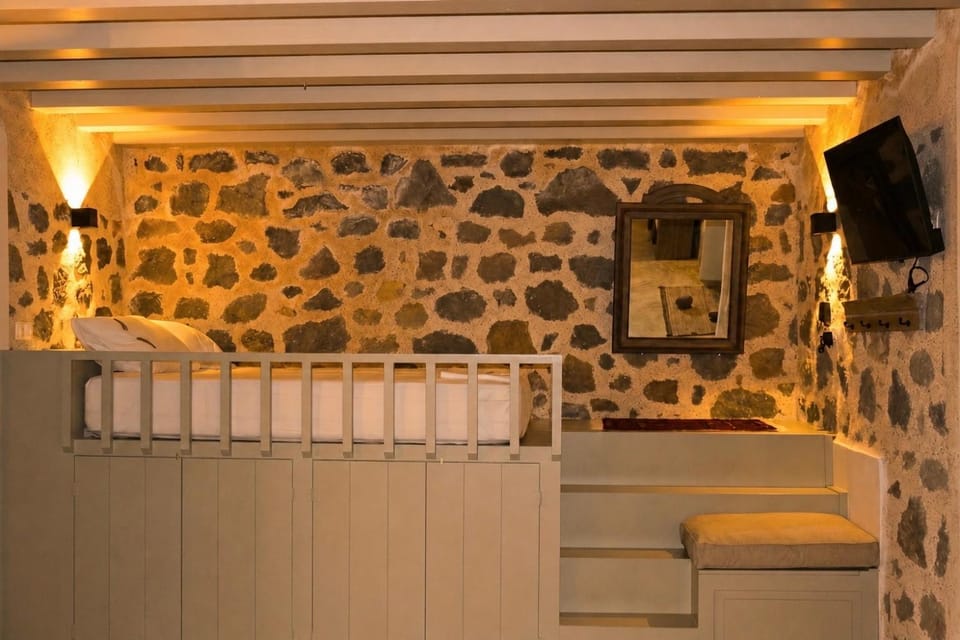 Pavlaina Complex of Traditional Residences in Nisyros. Enjoy the garden and the Sea View Apartment in Decentralized Administration of the Aegean