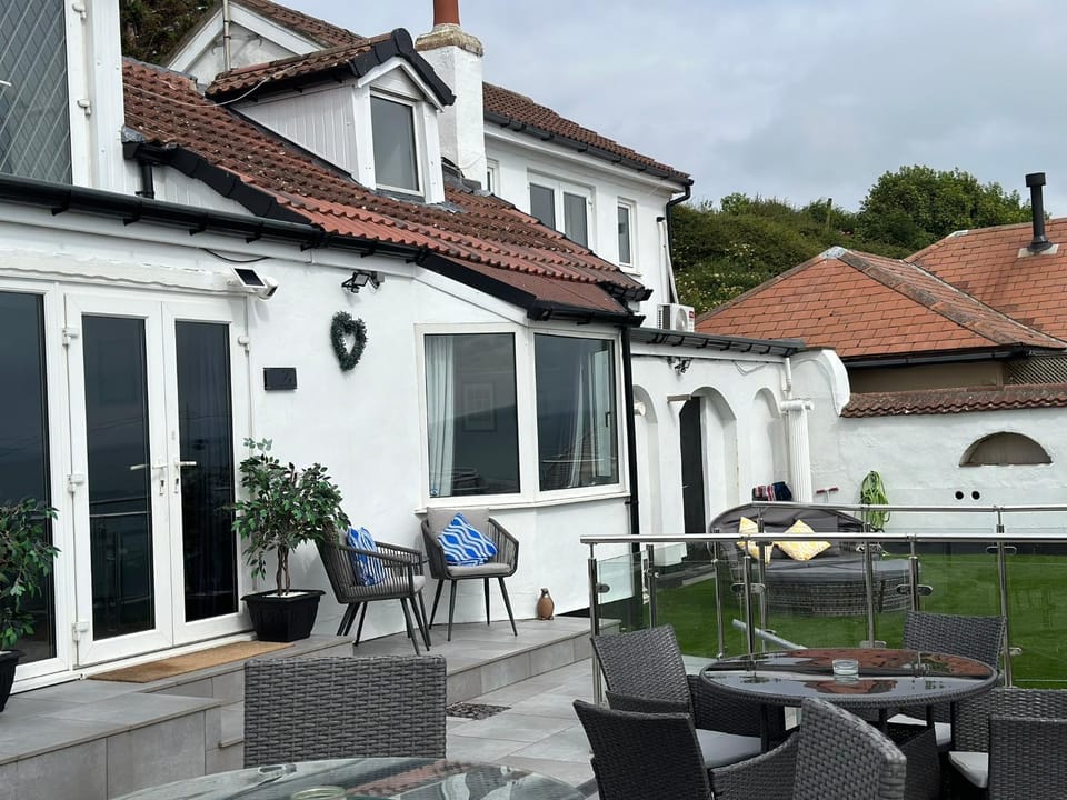 Property building, Patio, Seating area, Garden view