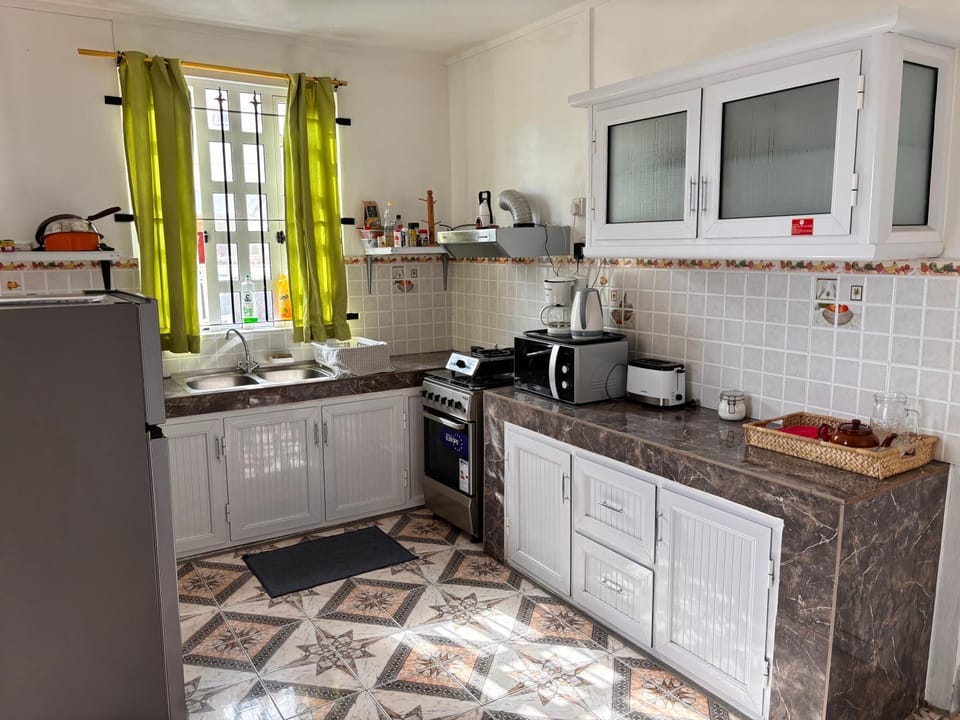 Kitchen or kitchenette, oven, stove, toaster