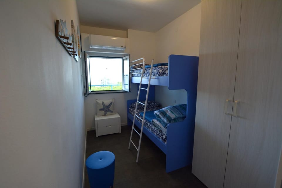 Bed, Photo of the whole room, bunk bed, wardrobe, air conditioner