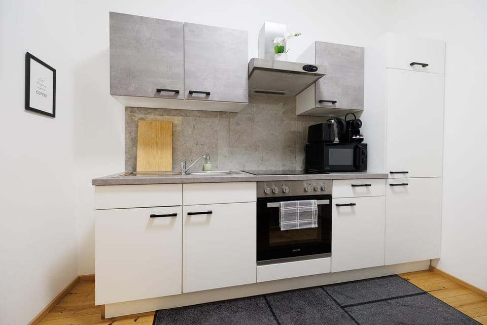 Kitchen or kitchenette, stove, toaster