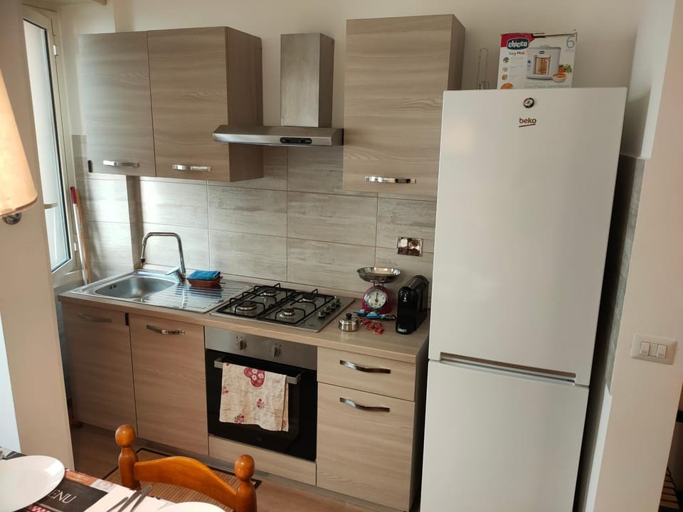 Kitchen or kitchenette, oven, stove