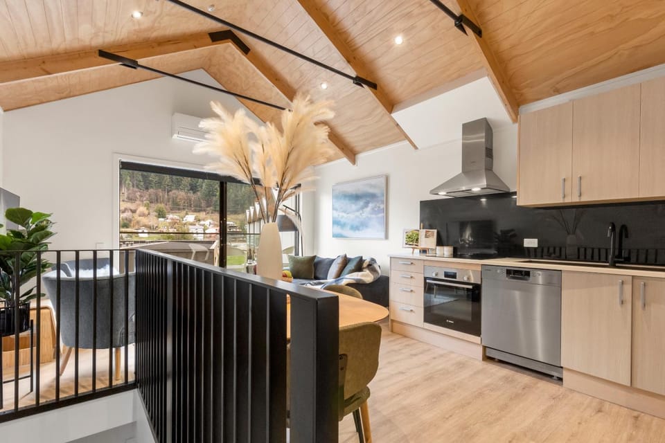 Kitchen or kitchenette, dishwasher, oven, stove
