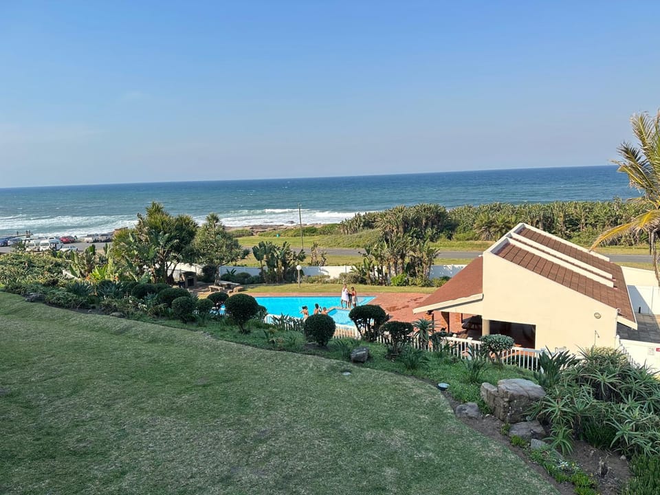 Property building, Natural landscape, Beach, Pool view, Sea view, Swimming pool