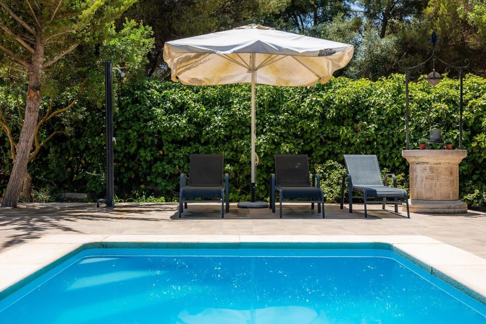 Property building, Living room, Swimming pool
