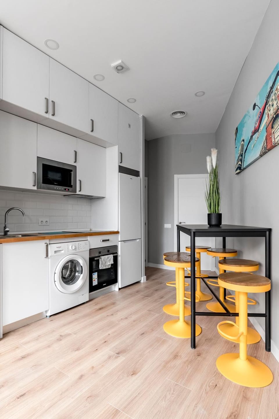 Kitchen or kitchenette, Dining area, oven, stove, washing machine