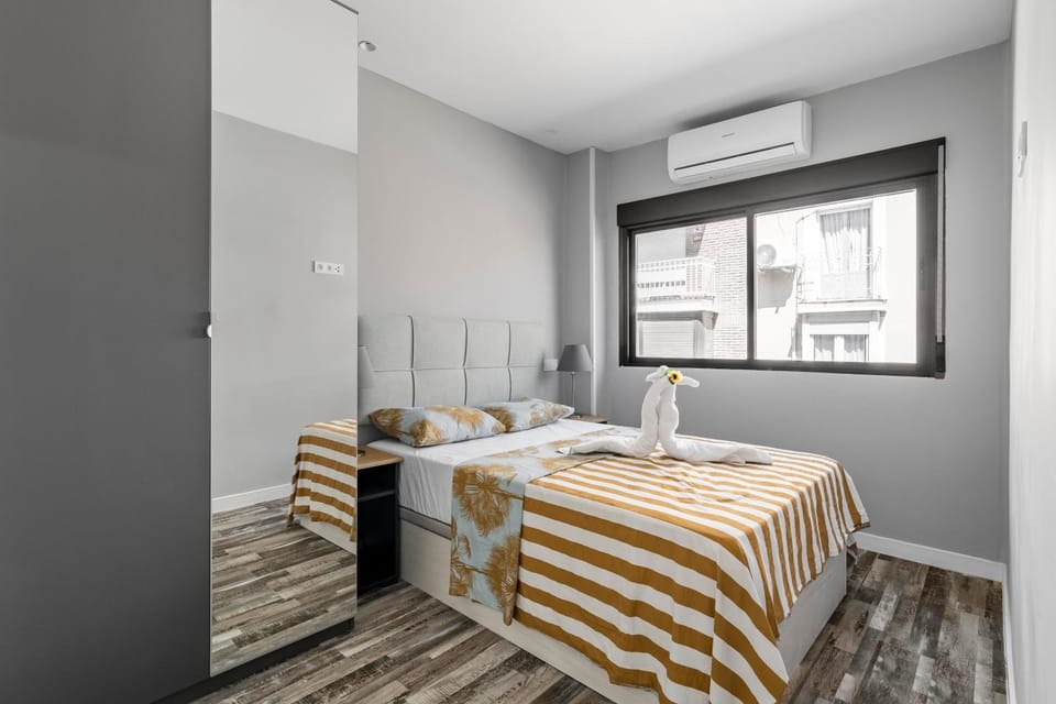 Bed, Photo of the whole room, Bedroom, towels, air conditioner