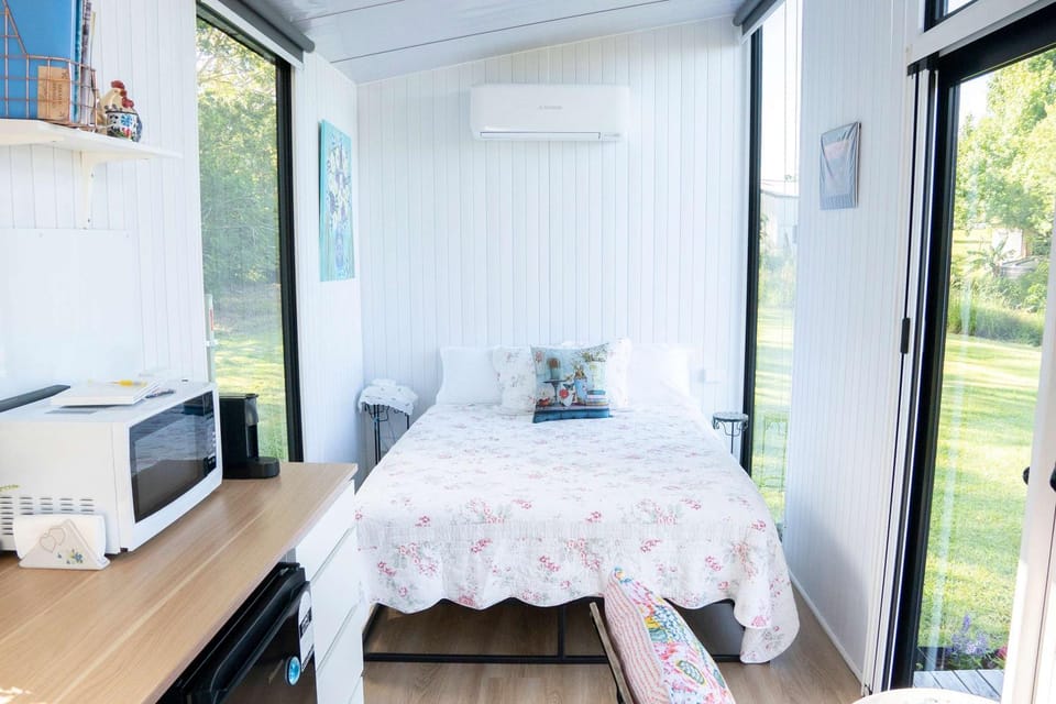 White Jacaranda Tiny House by Tiny Away House in Maleny