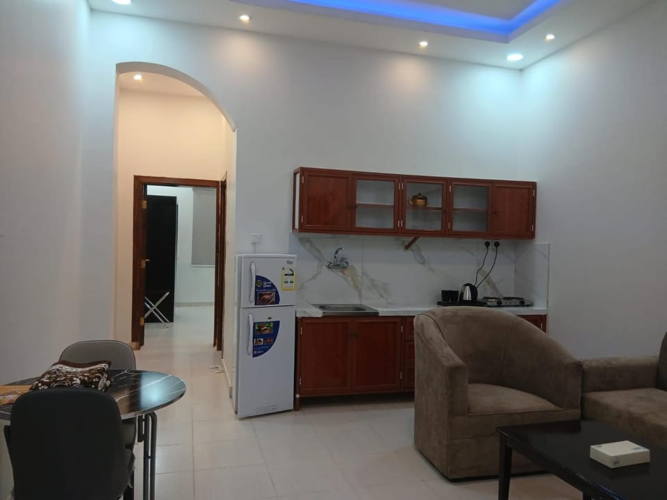 Kitchen or kitchenette, Living room, Seating area, Dining area, stove, washing machine