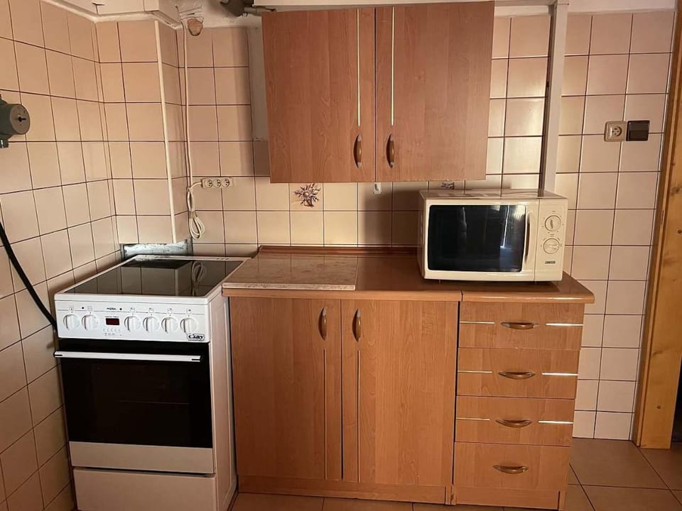 Kitchen or kitchenette, stove