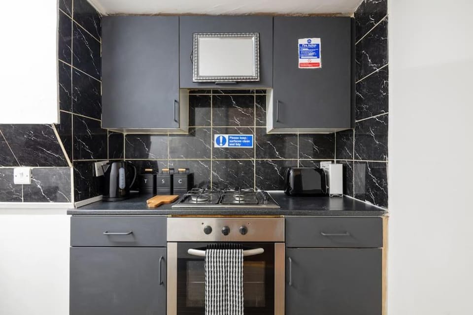 Kitchen or kitchenette, stove