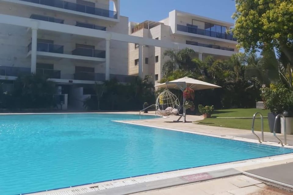 Garden and Pool at Royal Park Eilat Apartment in Eilat