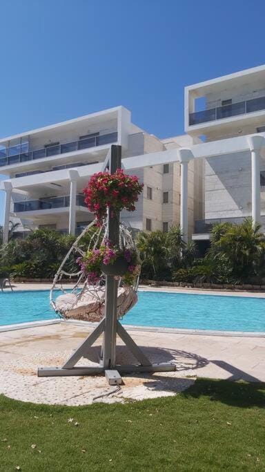 Garden and Pool at Royal Park Eilat Apartment in Eilat