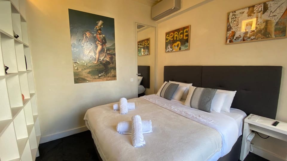 Bed, Photo of the whole room, Bedroom, towels, air conditioner