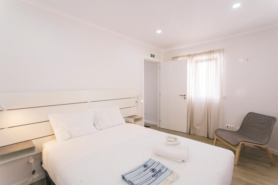 Bed, Living room, Photo of the whole room, Seating area, Bedroom, towels, wardrobe
