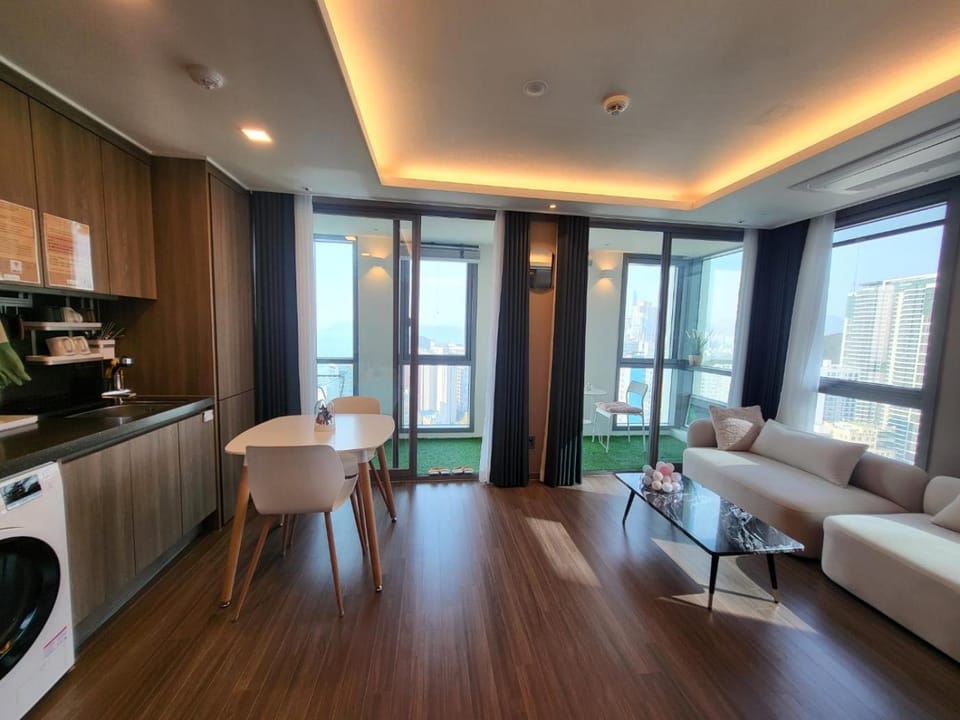 Living room, Seating area, Dining area, minibar, stove, washing machine