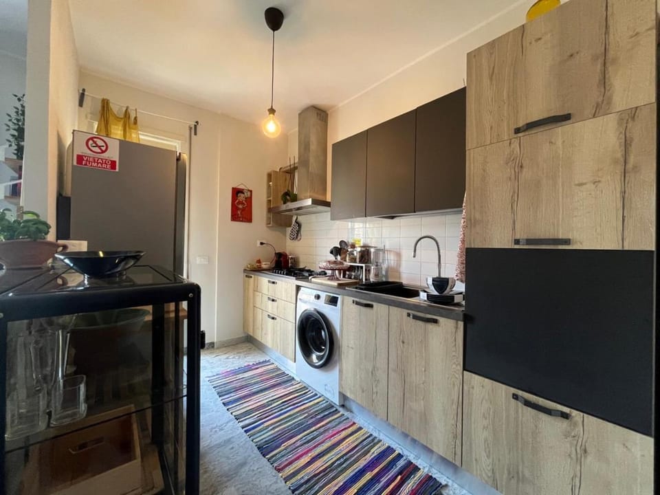 Kitchen or kitchenette, stove, washing machine, kitchen