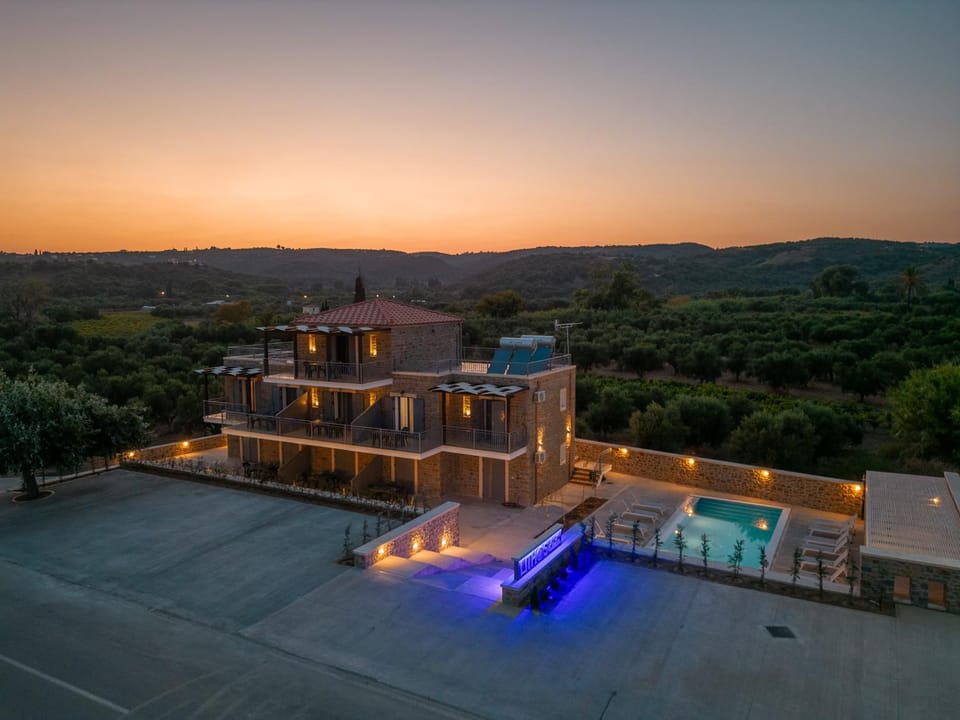Property building, Natural landscape, Bird's eye view, Pool view, Swimming pool, Sunset