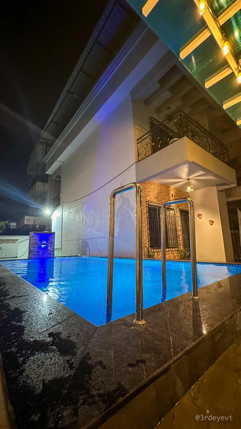 Patio, Night, Seating area, Pool view, Street view, Swimming pool, Quiet street view