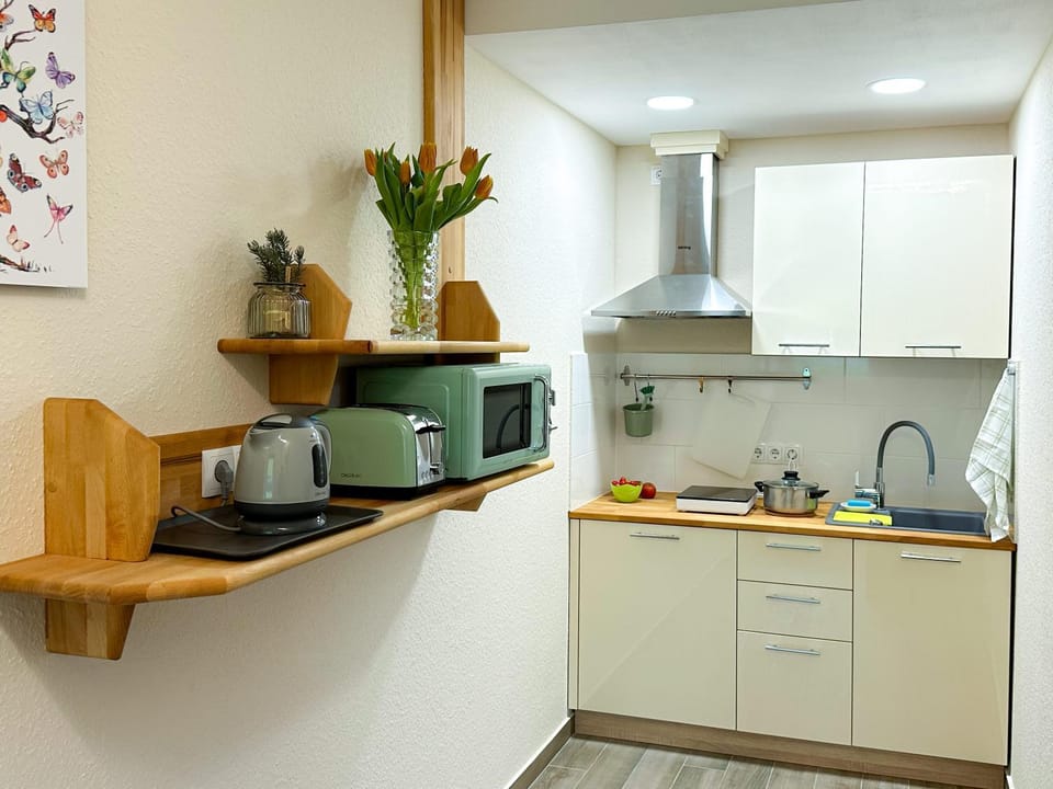 Dining area, minibar, toaster, kitchen