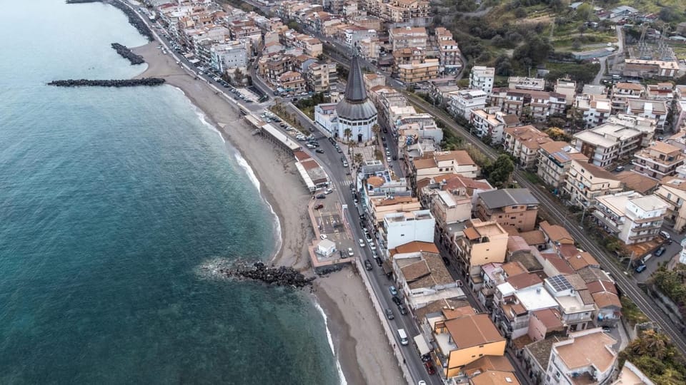 Nearby landmark, Day, Neighbourhood, Natural landscape, Bird's eye view, Beach, City view, Sea view, Location