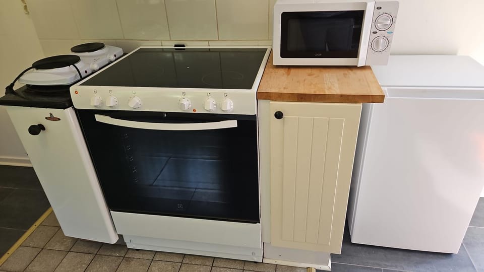 Kitchen or kitchenette, oven, stove