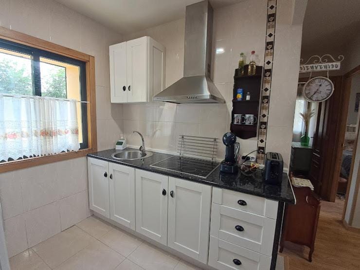 Kitchen or kitchenette, stove