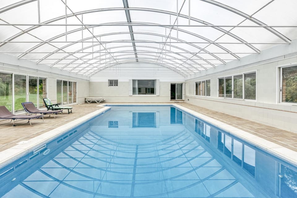 Property building, Living room, Swimming pool