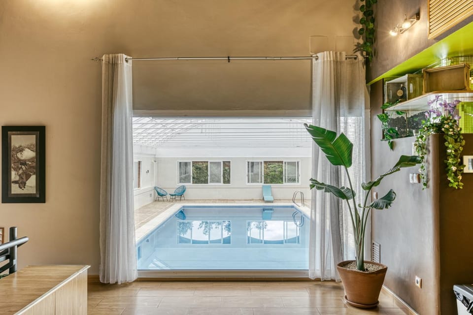 Property building, Living room, Swimming pool