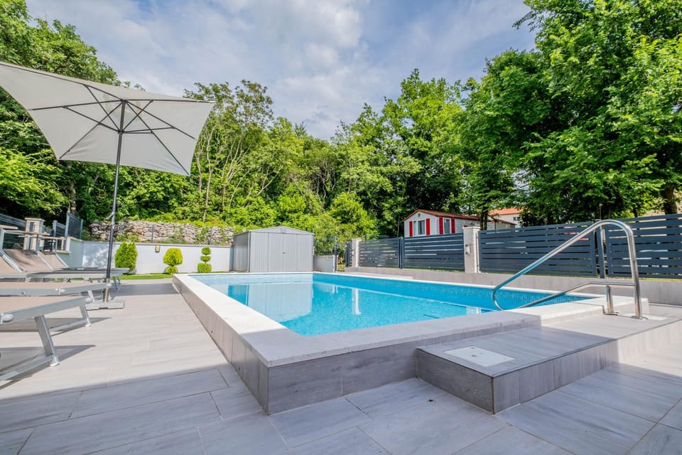 Patio, Natural landscape, Pool view, Swimming pool, sunbed