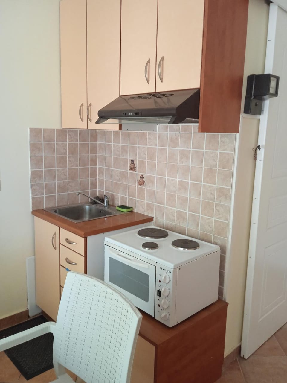 Kitchen or kitchenette, stove