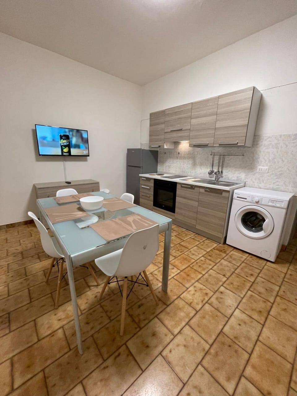 Kitchen or kitchenette, Dining area, oven, stove, washing machine, kitchen