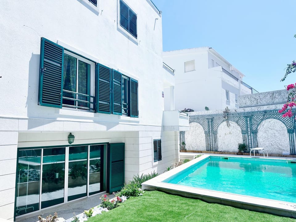 Property building, Day, Pool view, Swimming pool, sunbed