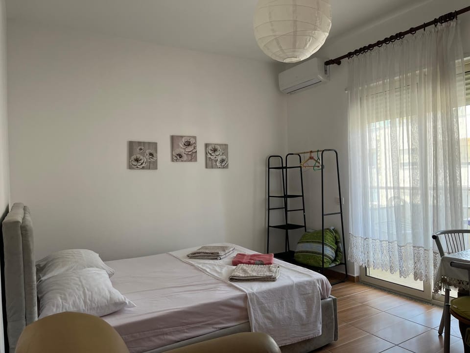 Bed, Photo of the whole room, Bedroom, towels, air conditioner