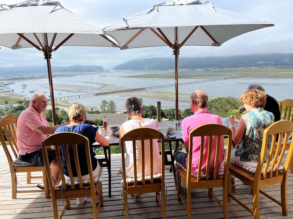 View (from property/room), Balcony/Terrace, Dining area, group of guests