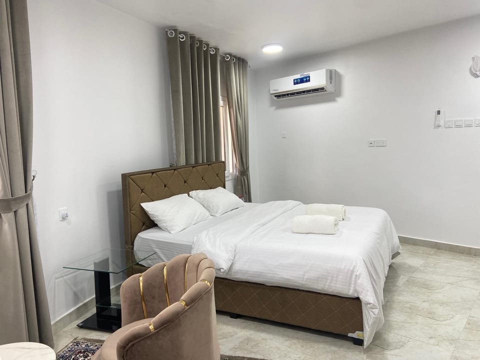Bed, Photo of the whole room, Bedroom, towels, air conditioner