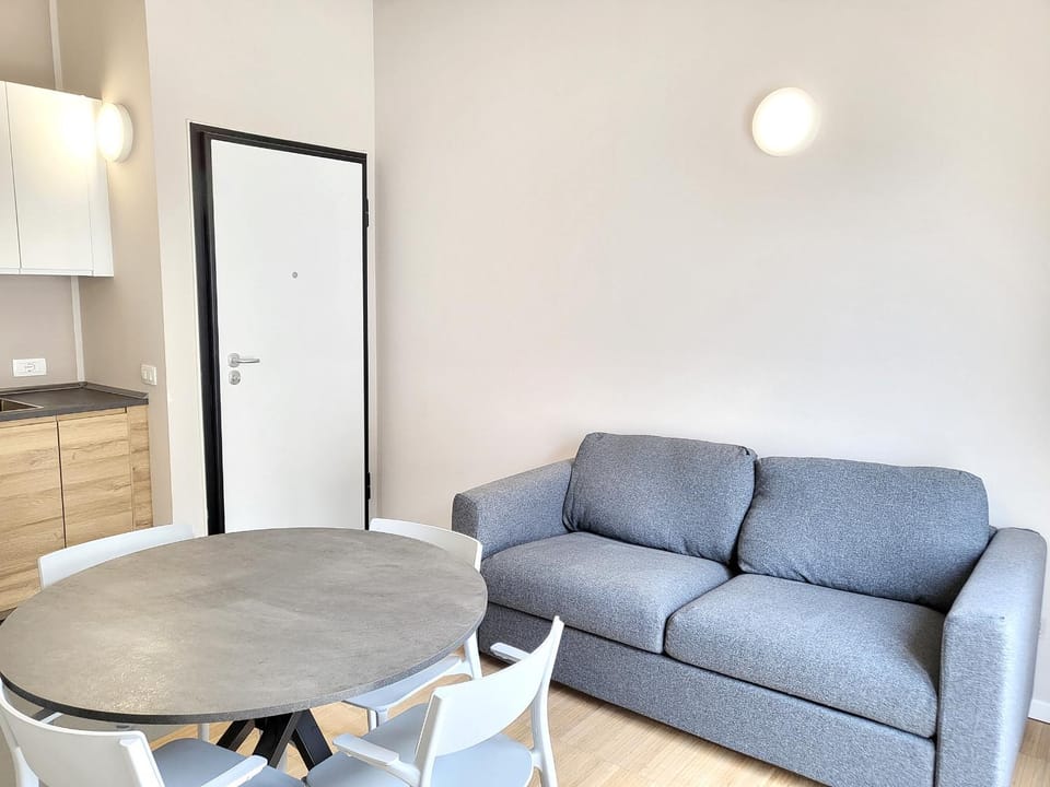 Kitchen or kitchenette, Living room, Seating area, Dining area