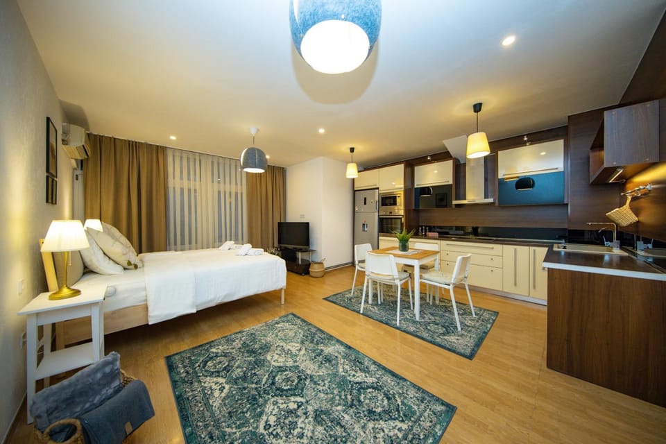 Bed, Living room, Seating area, Dining area