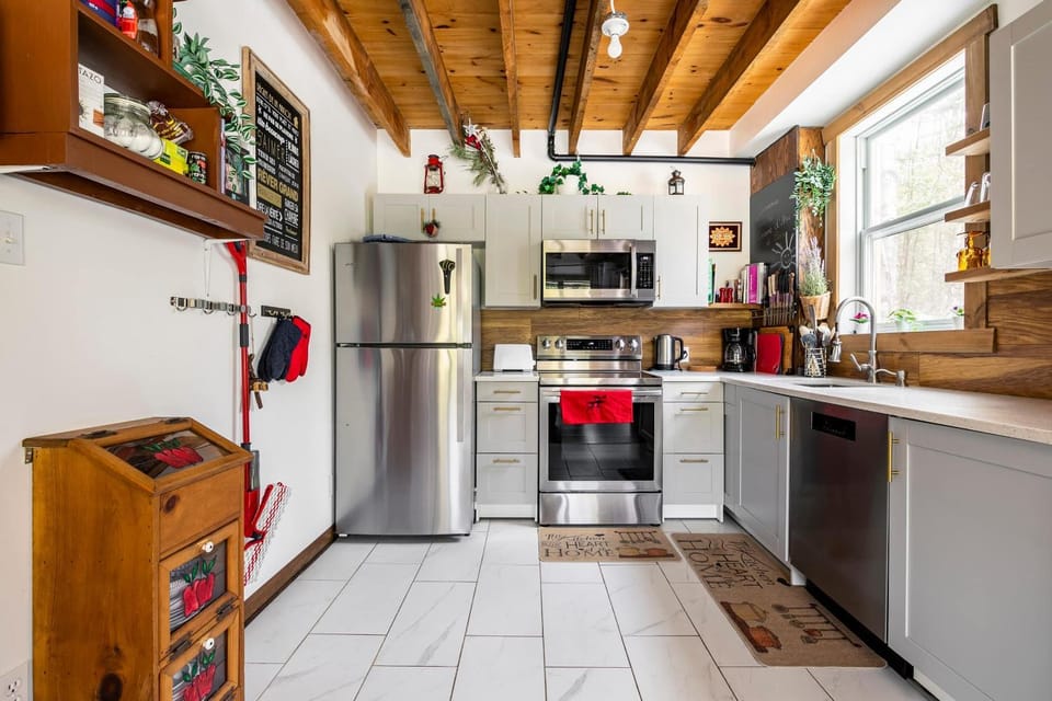 Kitchen or kitchenette, dishwasher, oven, stove, toaster