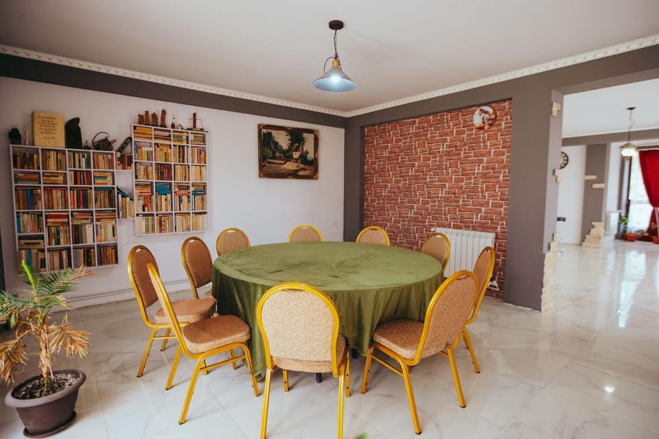 Library, Living room, Seating area, Dining area