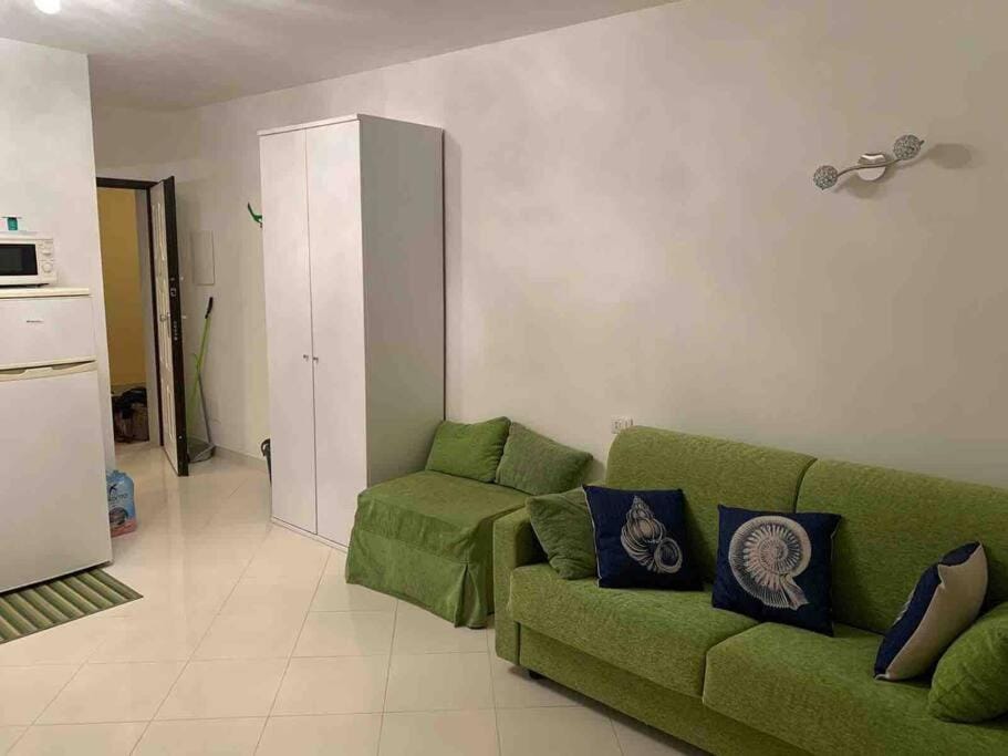 Bed, Living room, Seating area, wardrobe