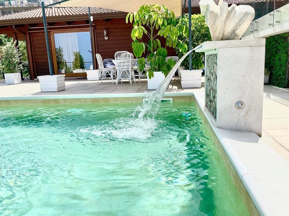 Property building, Hot Tub, Pool view, Swimming pool, sunbed