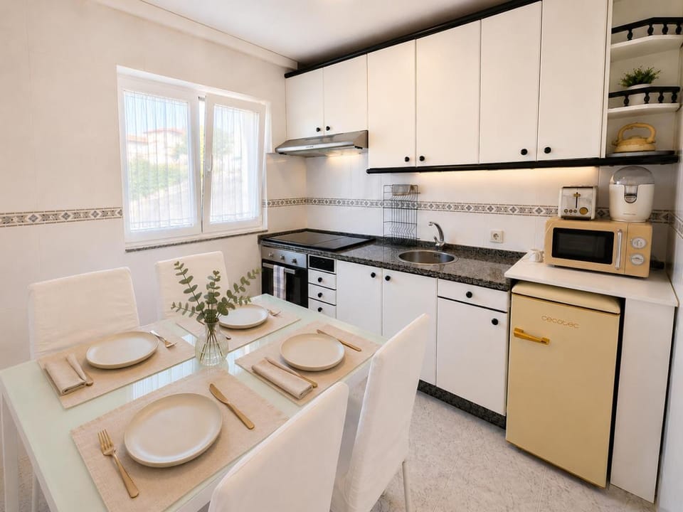 Kitchen or kitchenette, microwave, oven, stove, kitchen